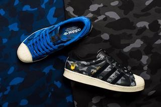 A BATHING APE® x UNDEFEATED x adidas Superstar 80s, covered in blue and black camo patterns. Photo by adidas Originals.