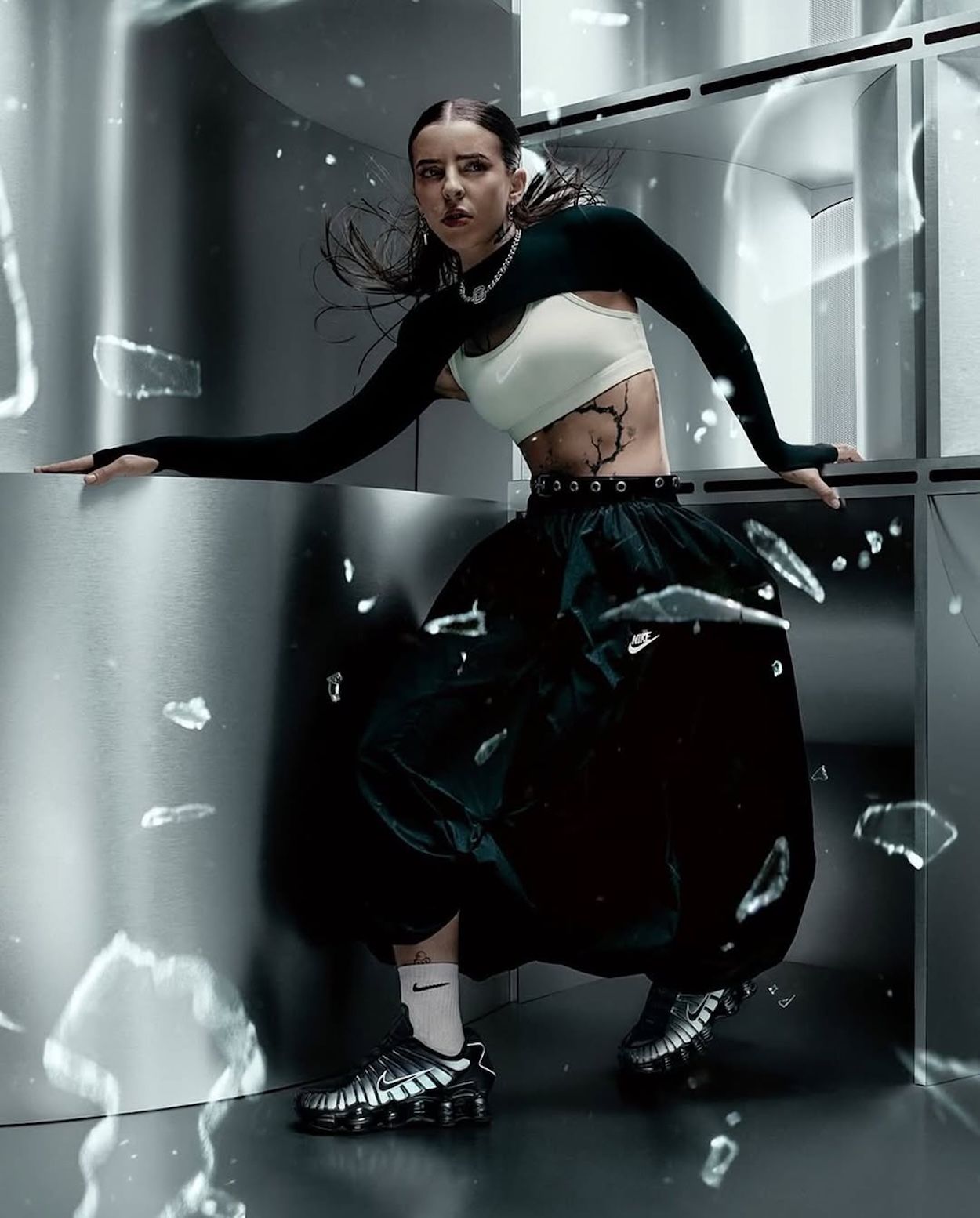 Puerto Rican artist Young Miko wearing Nike Shox TL for Nike Sportswear's "Not Here To Be Liked" Campaign.