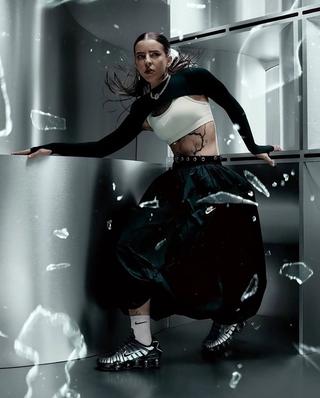 Puerto Rican artist Young Miko wearing Nike Shox TL for Nike Sportswear's "Not Here To Be Liked" Campaign.