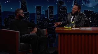 Jaylen Brown previewing a new 741 Basketball Shoe on the Jimmy Kimmel Show with Anthony Anderson.