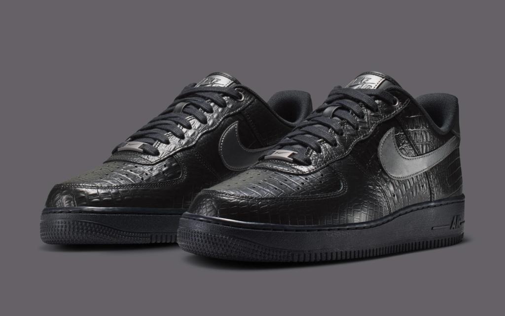 Nike Air Force 1 Low in Triple Black Croc, featuring crocodile-embossed overlays across the lateral and medial panels