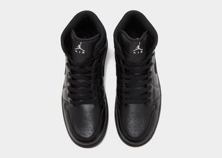 Men's Air Jordan 1 Low "Black/Silver" (SKU: N/A). Photo via JD Sports.