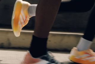 The Whitaker Group's two adidas Adizero Evo SL "Do Not Duplicate" collaborations.