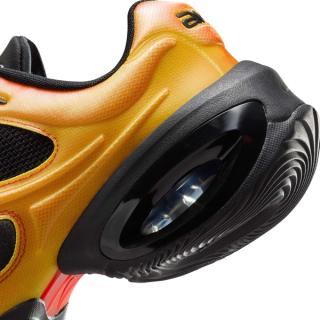 Heel close-up of Nike's Air Max Muse in a yellow, black, and red color scheme.