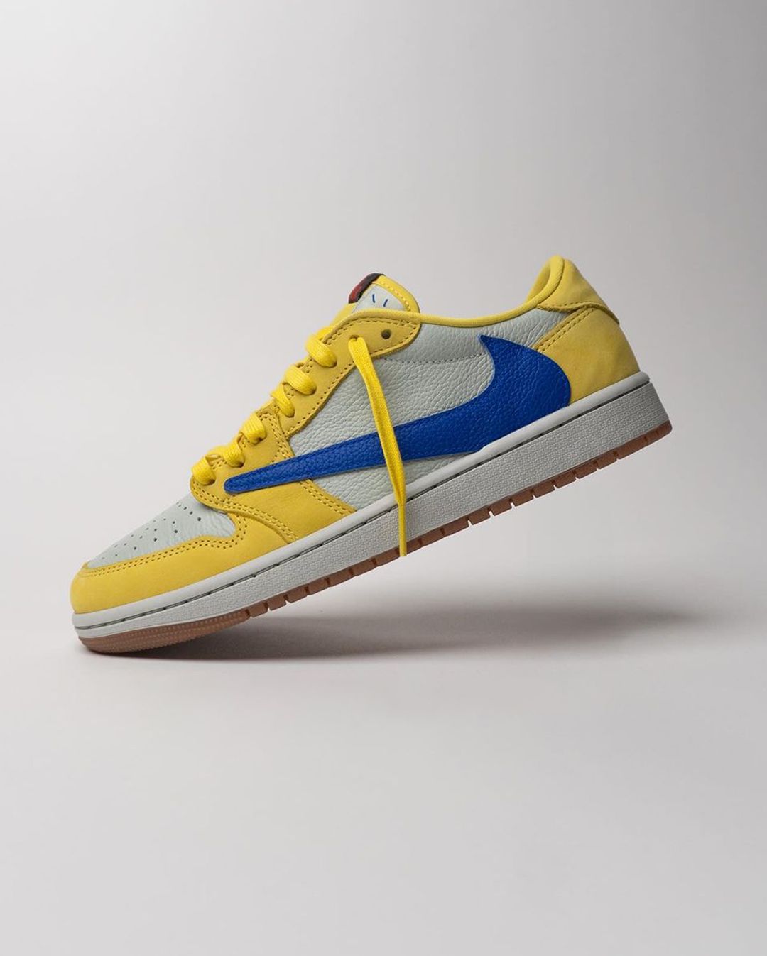 The Travis Scott x Air Jordan 1 Low OG “Canary” Releases May 17