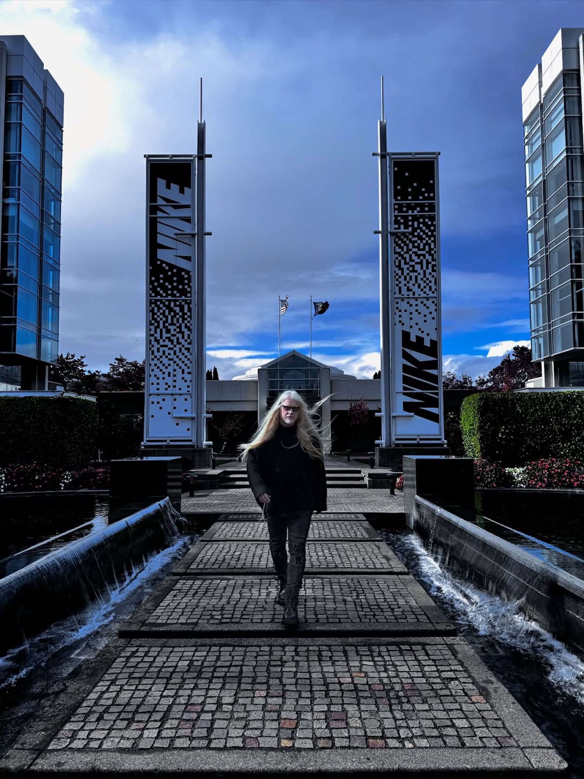 Christian Tresser, the legendary sneaker and footwear design veteran, walking on Nike's Philip H. Knight Campus in Oregon.