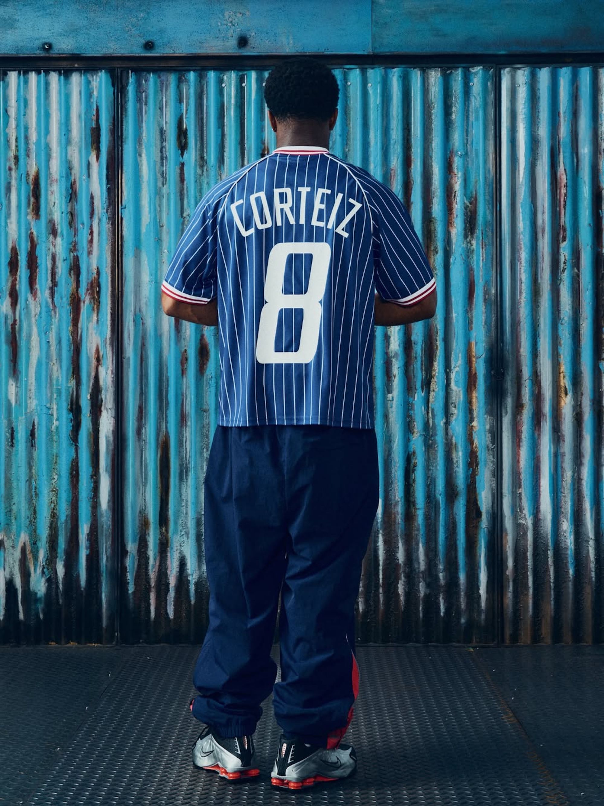 U.S.A.-inspired tracksuit & jersey combinations by Corteiz. Photo via Corteiz.