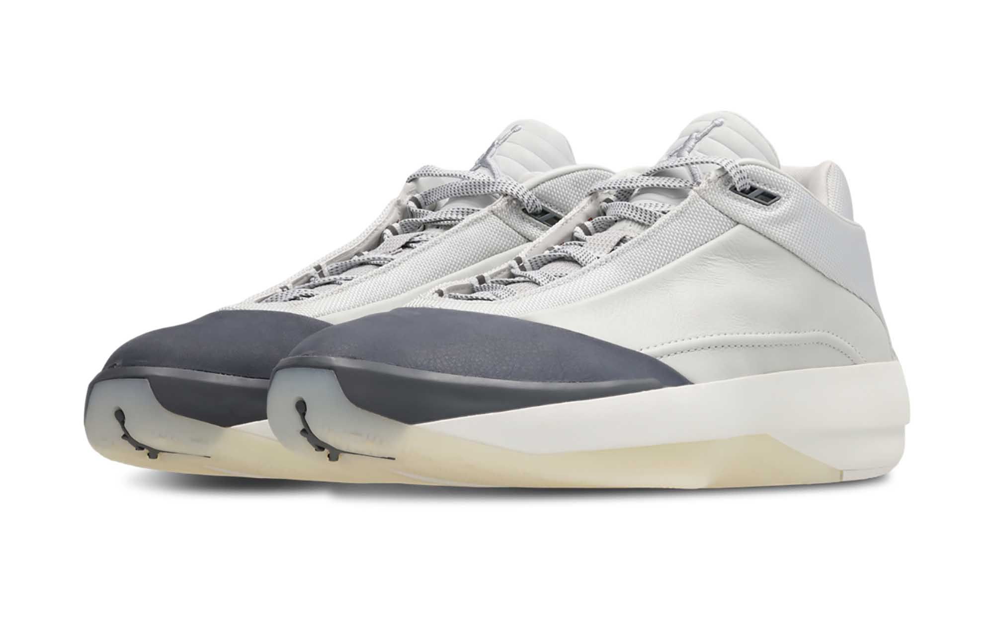 Air Jordan 40 basketball sneaker in a "Photon Dust/Flint Grey/Wolf Grey" color scheme.