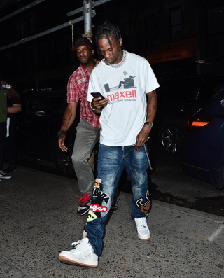 Travis Scott in the Travis Scott x Nike Air Force 1 Low