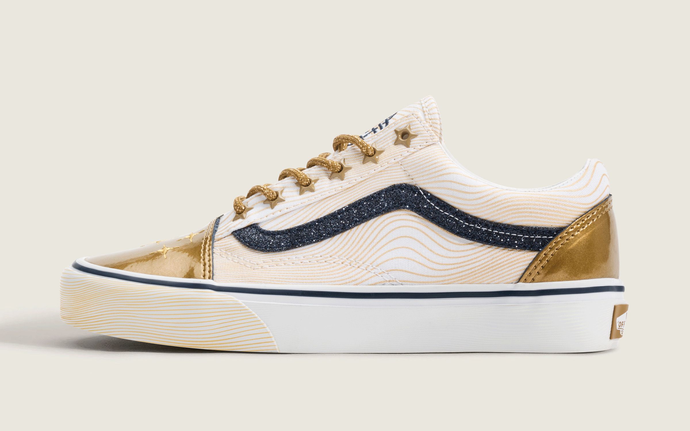 Big Kids' KPop Demon Hunters x Vans Old Skool "Golden" (SKU: VN000ECUGLD). Photo via Vans.