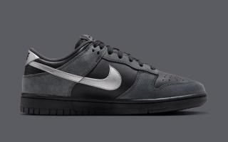 Medial angle of the Nike Dunk Low covered in a "Black/Anthracite/Metallic Dark Grey" color scheme.