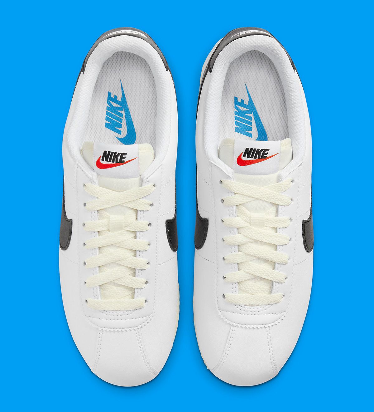 Nike cortez black hot sale and blue