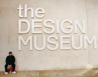 NIGO sitting outside the Design Museum in London in anticipation of the 'NIGO: From Japan with Love' retrospective exhibition.