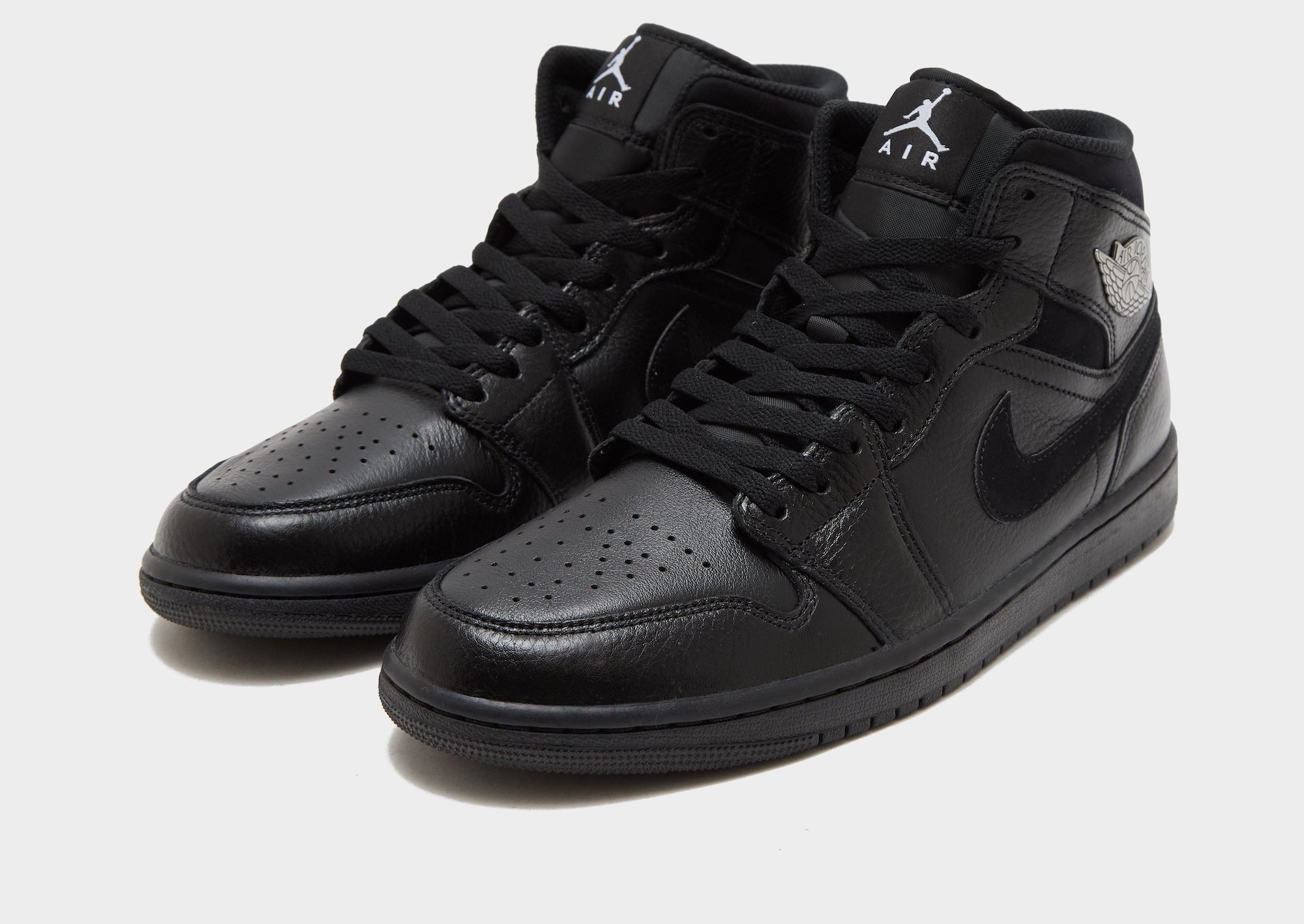Men's Air Jordan 1 Low "Black/Silver" (SKU: N/A). Photo via JD Sports.
