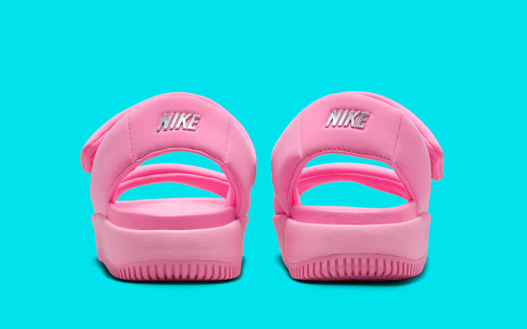Pretty Pink Pops Up On Nike's Latest Calm Sandal | House of Heat°