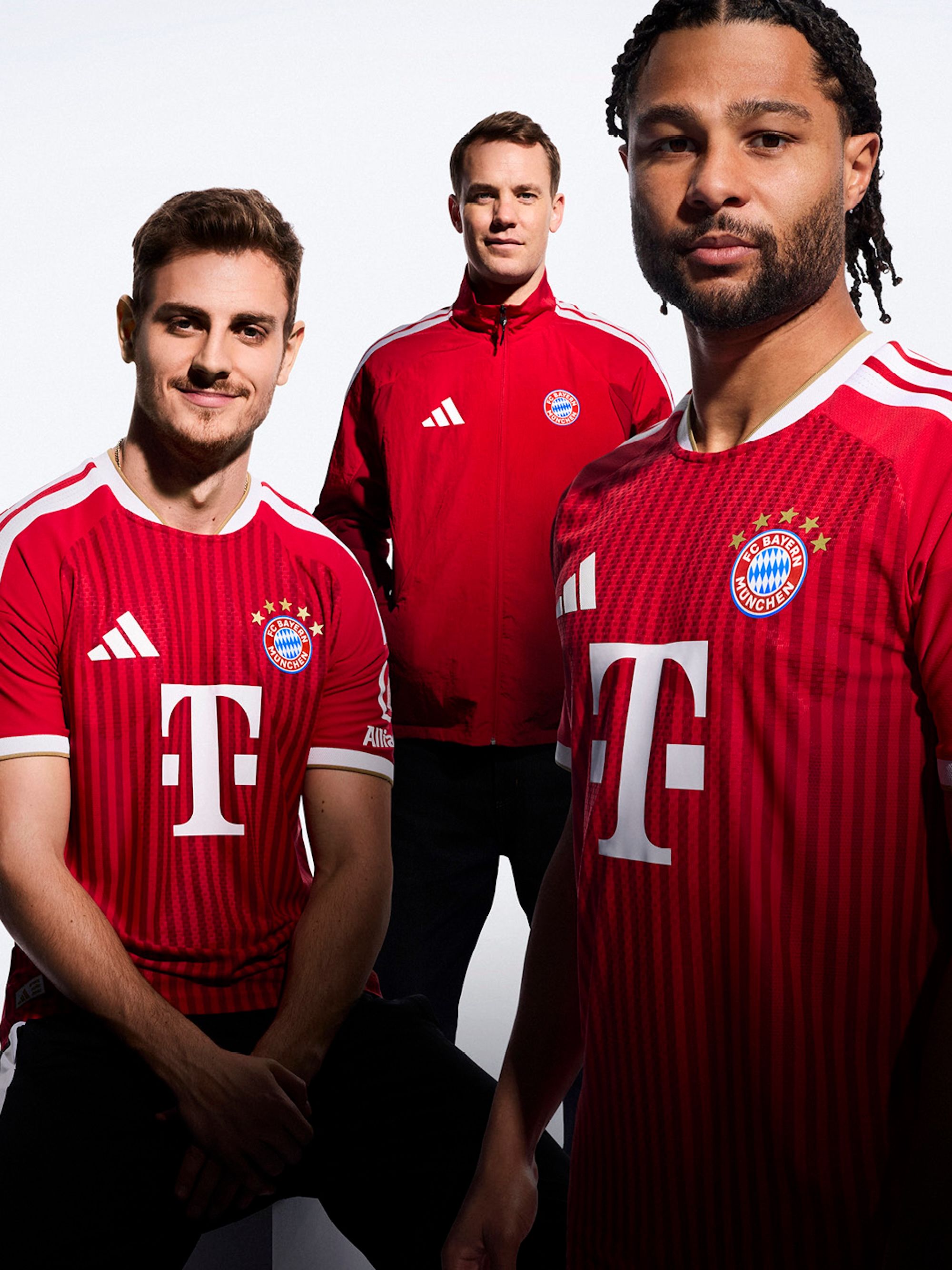 Josip Stanišić, Manuel Neuer & Serge Gnabry in promo visual for Bayern Munich's 2026/27 Home kit by adidas.
