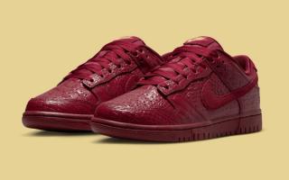 Women's Nike Dunk Low in an elegant, faux "Team Red Croc" makeover.