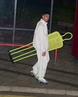 Arsenal and France's professional footballer, William Saliba, wearing the 2026 edition of the "Neon" Air Max 95 by Nike. The sneaker features a Big Bubble Air Max unit.