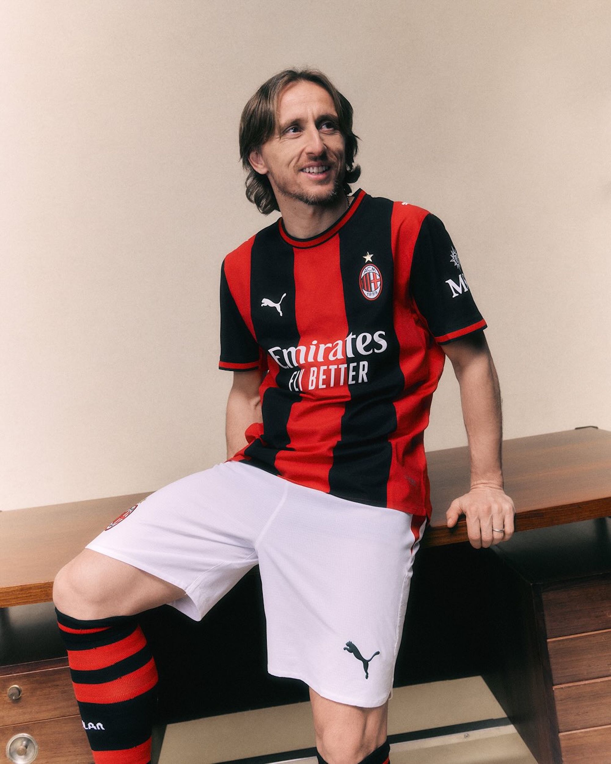 Luka Modrić wearing the AC Milan 2026-27 Home kit by PUMA.