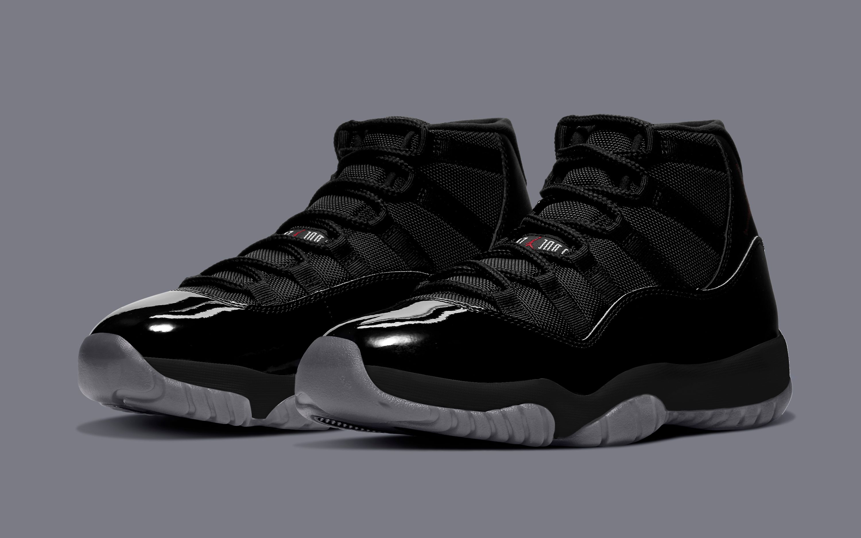 Black on black jordan 11 hotsell