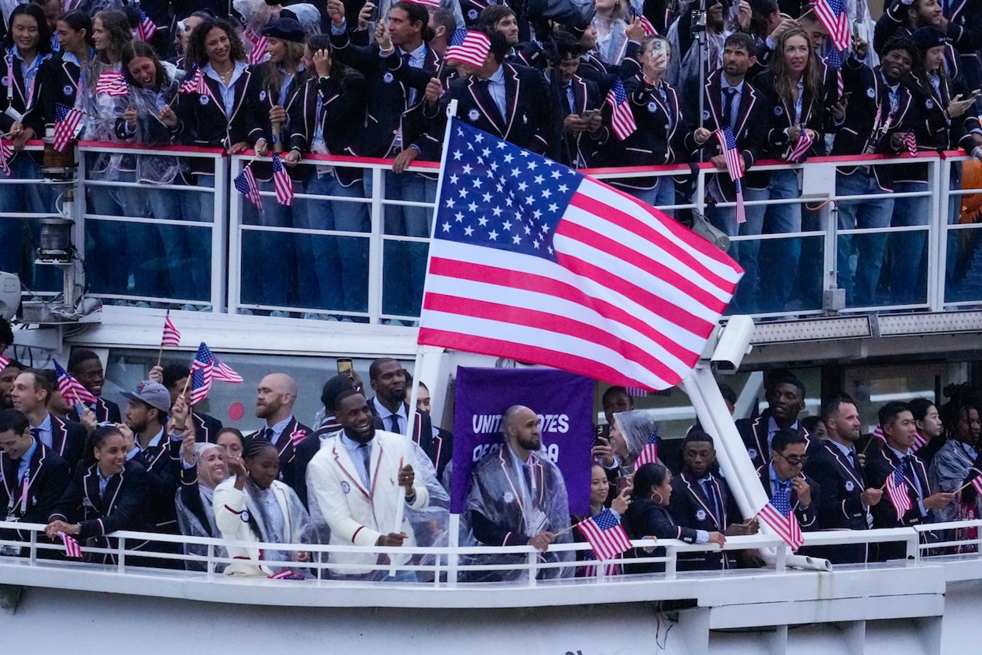 LeBron James as Team USA's Flag Bearer. Photo via AP Photo.