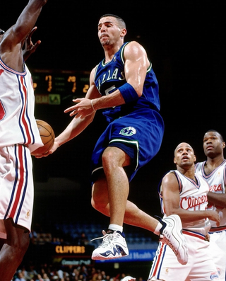 Jason Kidd wearing the Nike Zoom Flight V “White/Midnight Navy.”