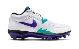 Jordan Stadium 90 Low TD football cleats in a "Grape" color scheme.