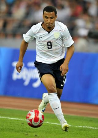 Charlie Davies wearing USMNT's Home 2008 jersey.Photo via USA TODAY Sports.