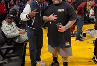 Action Bronson wearing collaborative New Balance 2811 sneaker.