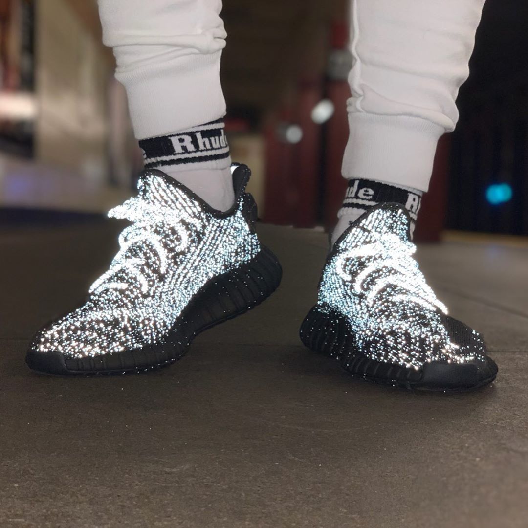 Yeezy black reflective on 2024 feet