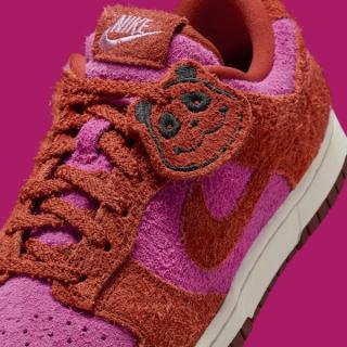Nike's Dunk Low "Panda" in a "Picante Red" color scheme.