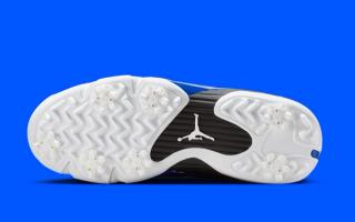 Golf-ready outsole of the Air Jordan 14 Golf shoe in a "White/Hyper Royal/Black" color scheme.