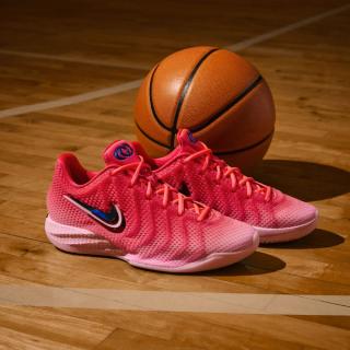 Nike Caitlin 1 "Midnight Fever" basketball shoe in a "Hot Punch/Neo Pink" color scheme.