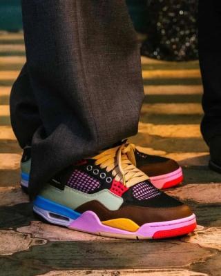 J Balvin wearing his "Lemonade" Air Jordan 4 collaboration.
