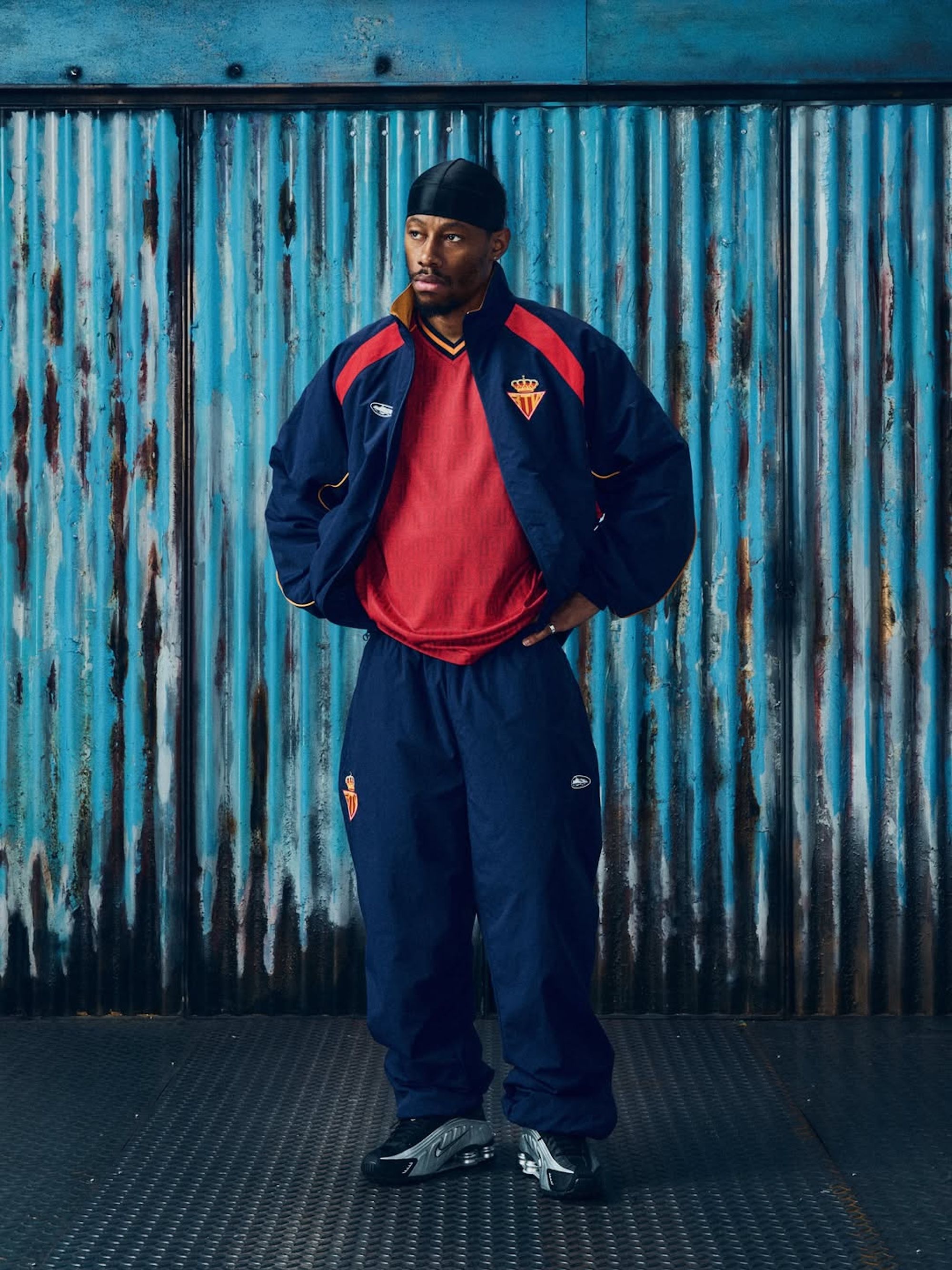 Spain-inspired tracksuit & jersey combinations by Corteiz. Photo via Corteiz.