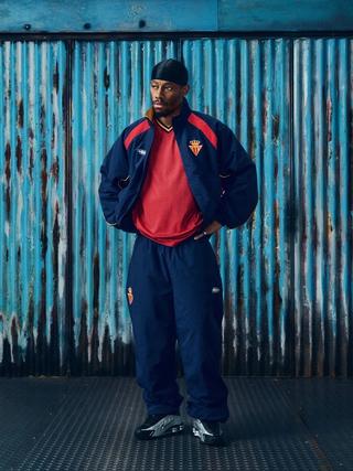 Spain-inspired tracksuit & jersey combinations by Corteiz. Photo via Corteiz.