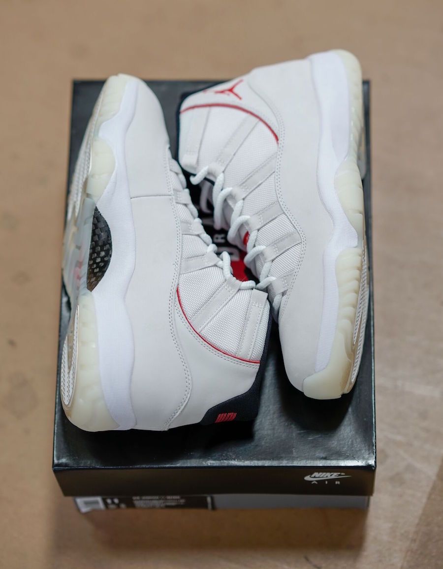 Jordan 11 platinum tint on sale fake