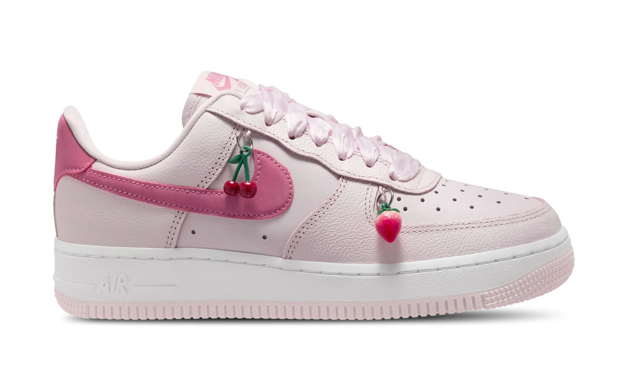 Valentine's Day-inspired Nike Air Force 1 Low in a "Pearl Pink" color scheme, complete with fruit-shaped charms.