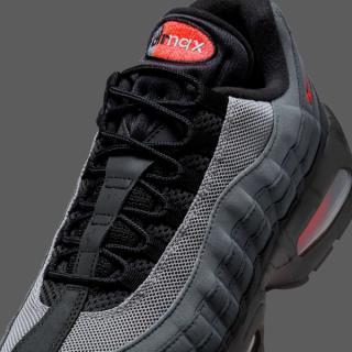 Close-up view of Nike's Air Max 95 in a "Black/Bright Crimson/Anthracite/Iron Grey" color scheme.