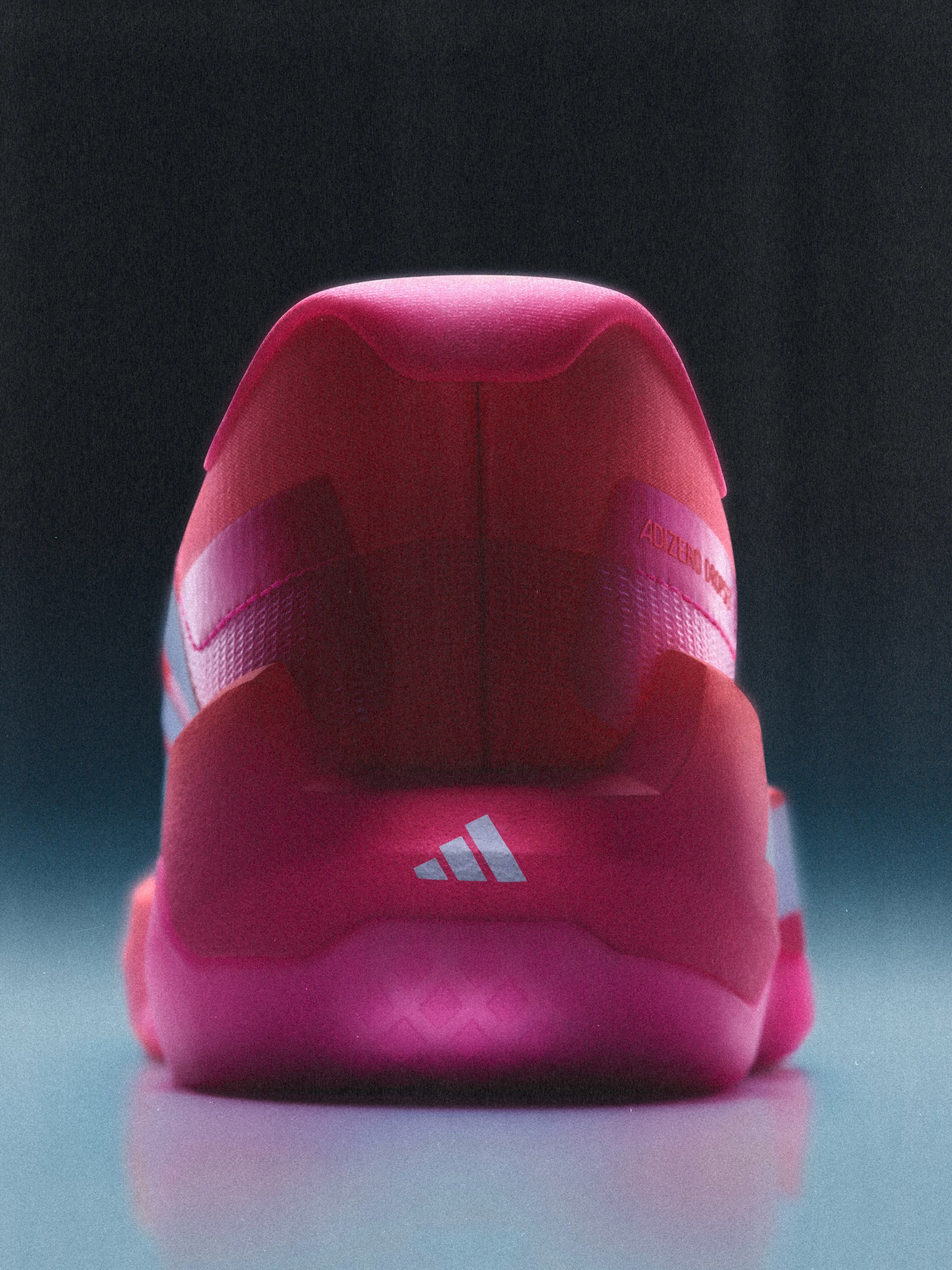 Women's adidas Adizero Dropset Pro "Solar Turbo/Lucid Pink" (SKU: KK1554). Photo via adidas.