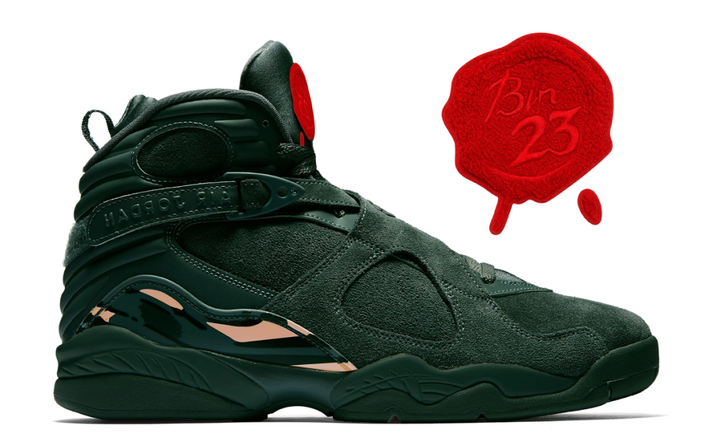 Air Jordan 8 'Bin 23' in full profile, showcasing the classic silhouette's ankle collar and Air unit construction