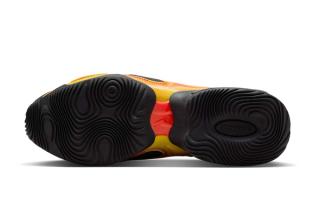 Outsole of Nike's Air Max Muse in a yellow, black, and red color scheme.