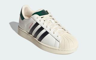 Adidas Superstar II in a racing-inspired, white, black, and green color scheme.