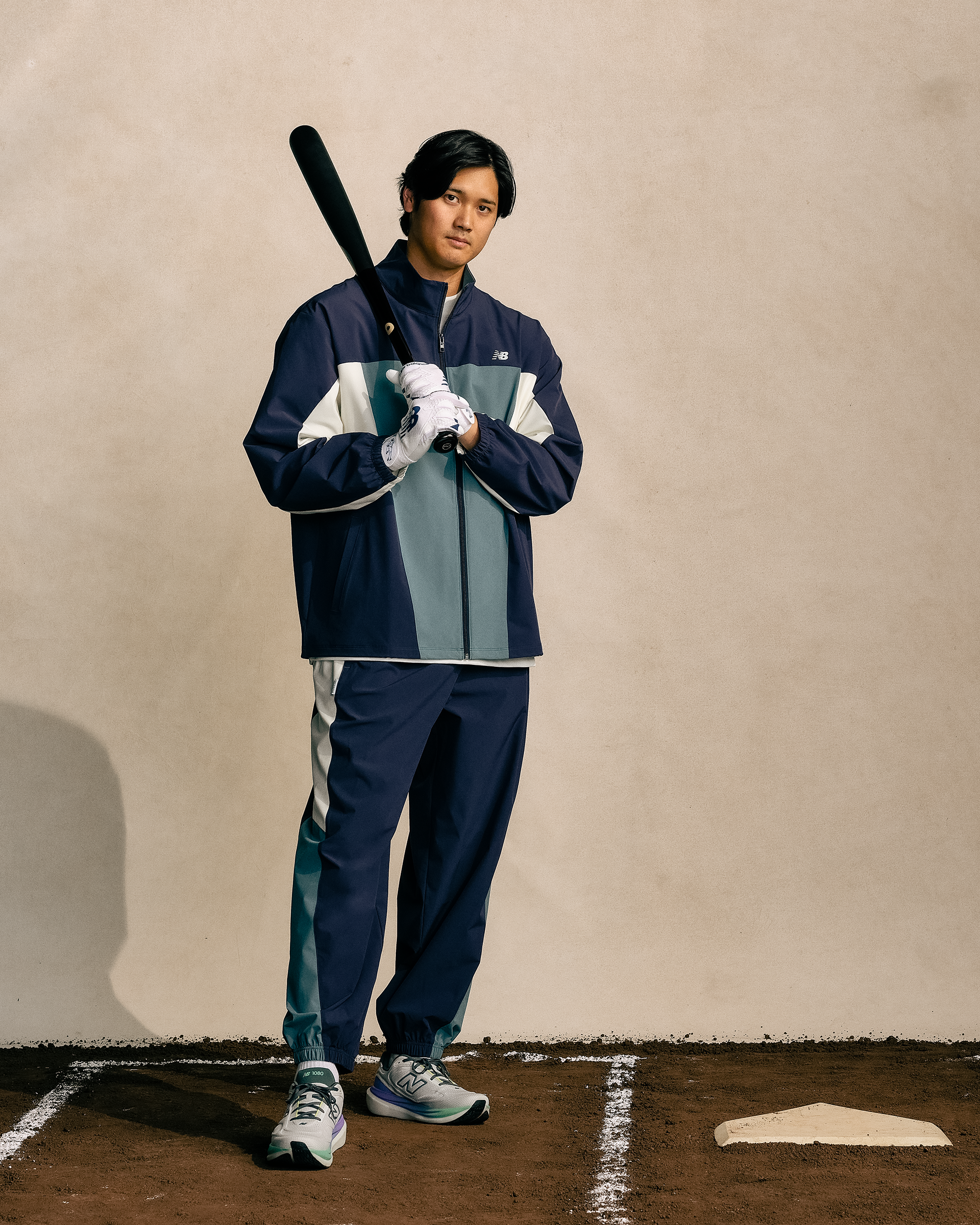 Shohei Ohtani modeling items from his new New Balance Signature Collection.
