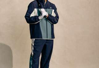 Shohei Ohtani modeling items from his new New Balance Signature Collection.