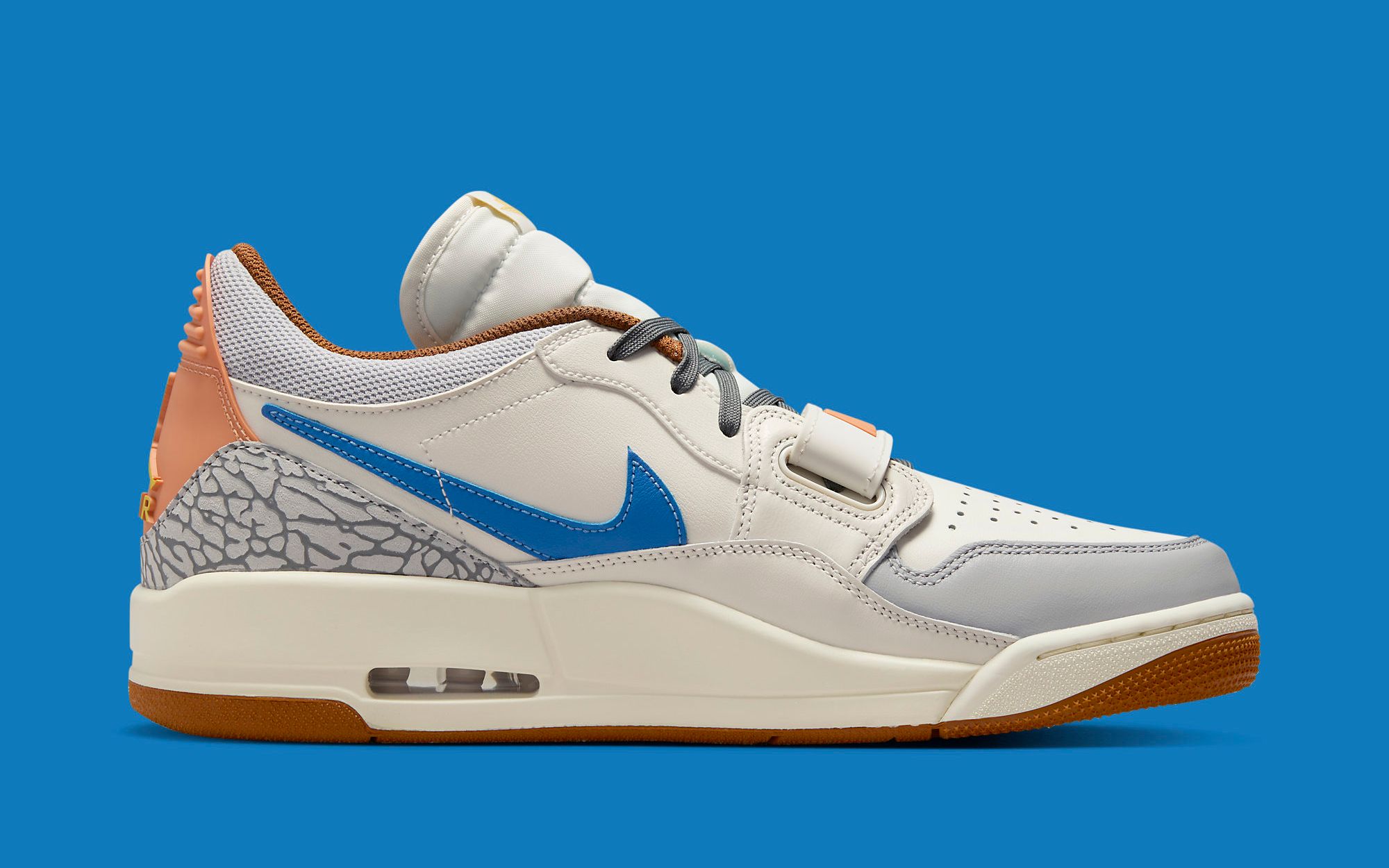 The Jordan Legacy 312 Low Suits Up in Sail, Royal and Russet