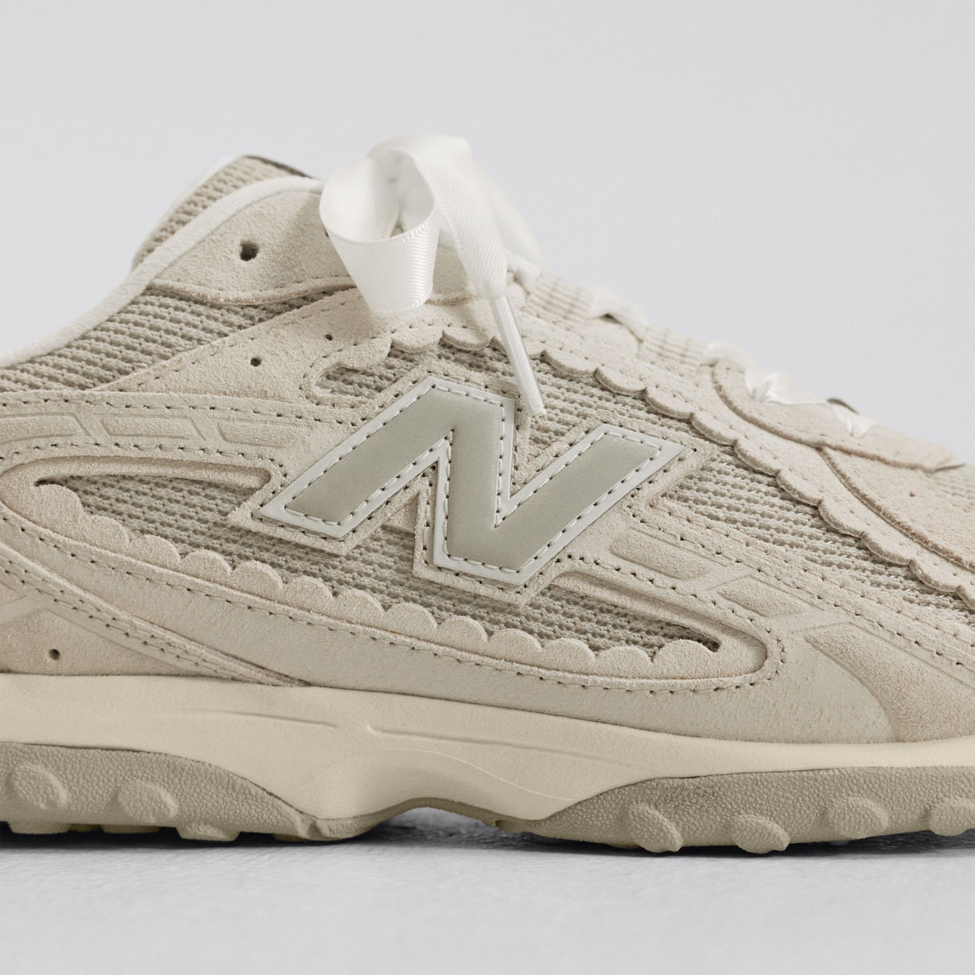 Japan's atmos Pink Bring Cow Print to the New Balance 204L | House