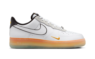Basketball-inspired Nike Air Force 1 Low in a "White/Black/Orange Peel" color scheme.