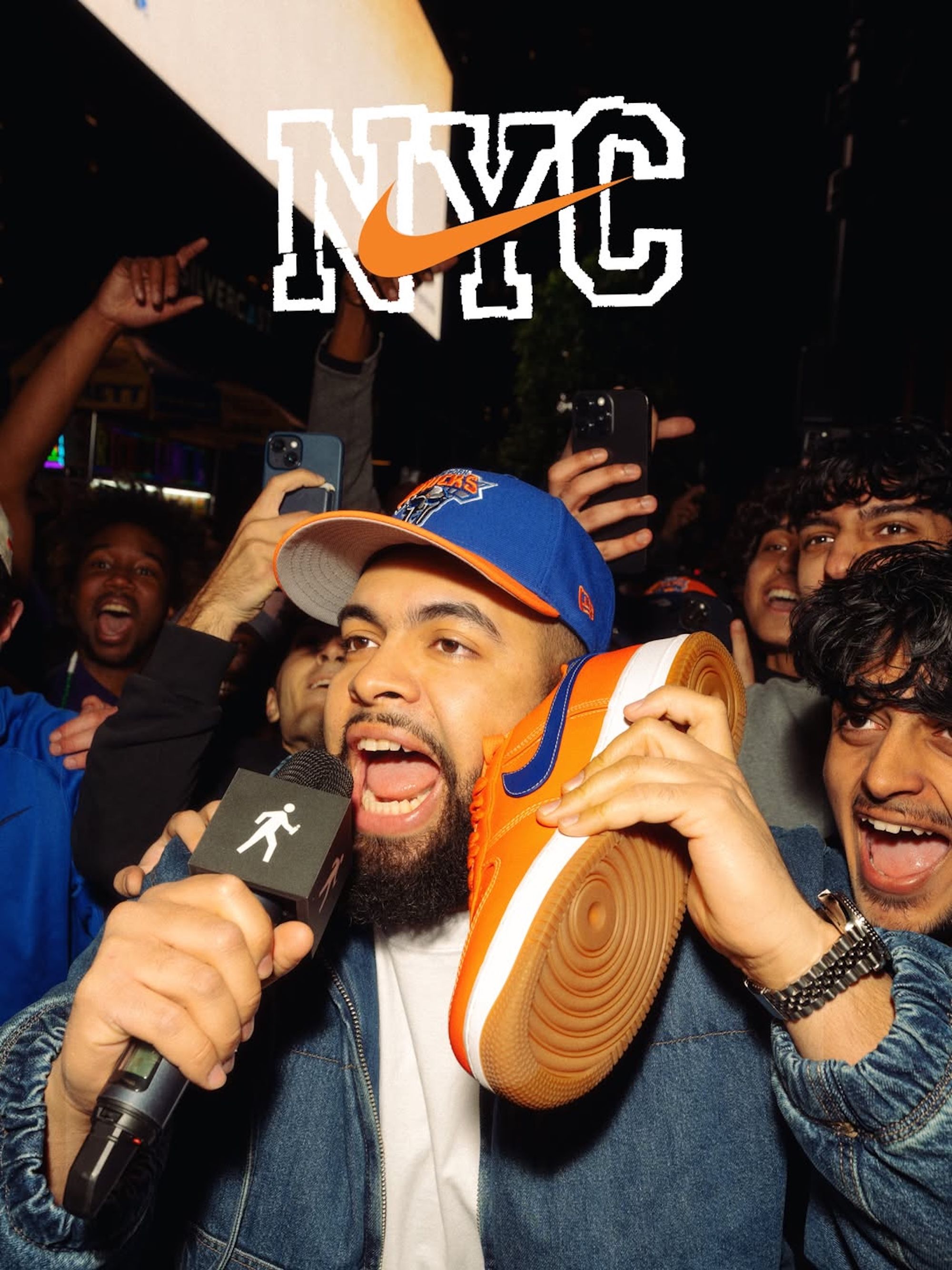New York Knicks fan with the Knicks-inspired Nike NYC Air Force 1 in orange-and-blue.