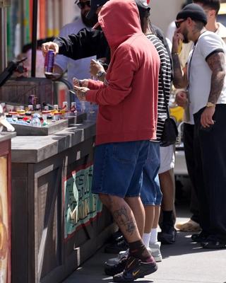Rauw Alejandro wearing the "Velvet Brown" Kids Of Immigrants x Nike T90 Mule. Photo via Rauw Alejandro.